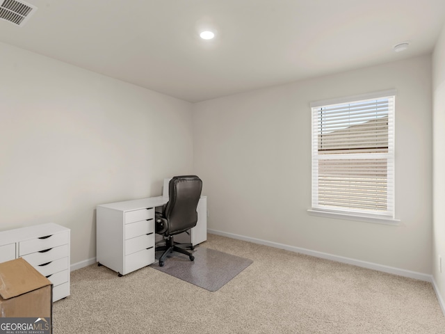 office featuring light carpet, recessed lighting, visible vents, and baseboards