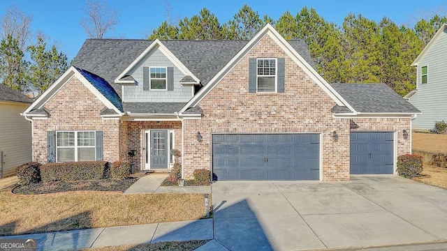 view of front of house featuring concrete driveway, brick siding, and a shingled roof