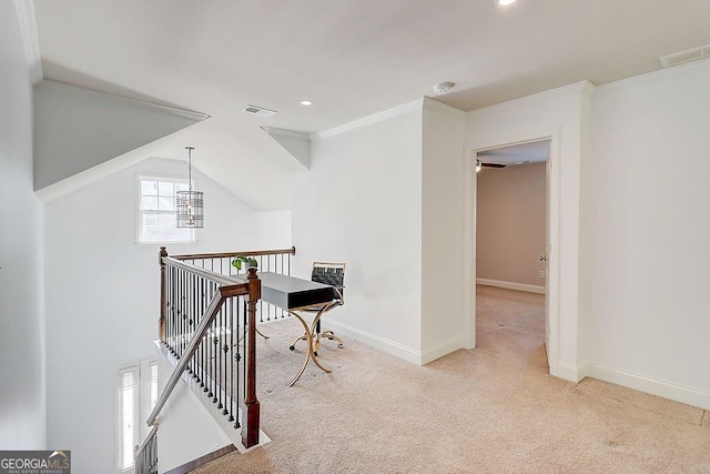 hallway with visible vents, carpet, an upstairs landing, and baseboards