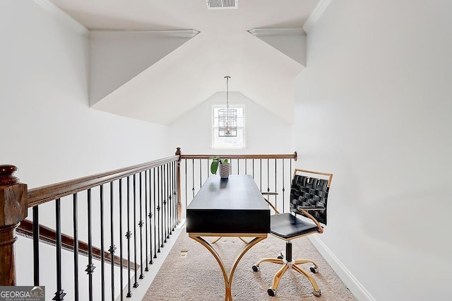 office featuring baseboards, visible vents, lofted ceiling, an inviting chandelier, and carpet flooring