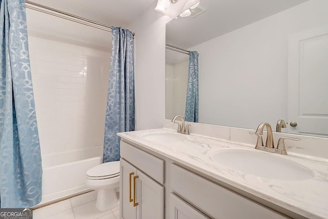 bathroom with visible vents, a sink, toilet, and tile patterned floors