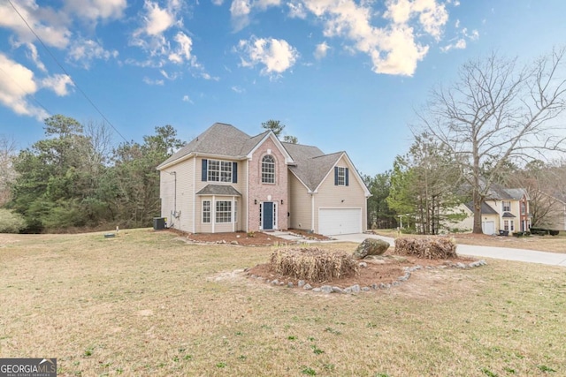 traditional-style home featuring concrete driveway, central AC, brick siding, and a front lawn