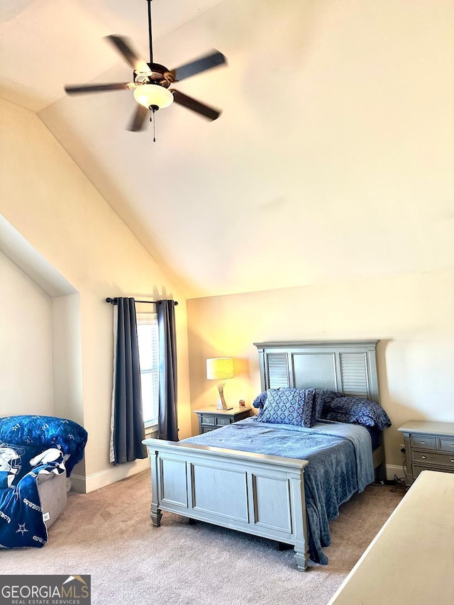 bedroom featuring lofted ceiling, ceiling fan, baseboards, and light colored carpet