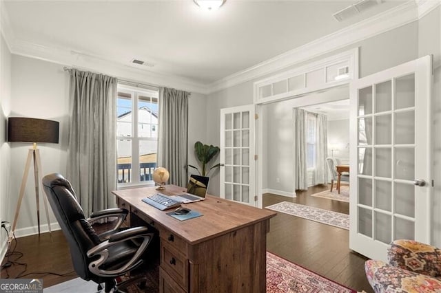 office area featuring dark wood-type flooring, french doors, visible vents, and crown molding