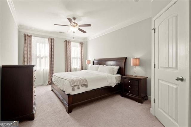 bedroom with ceiling fan, visible vents, ornamental molding, and light colored carpet