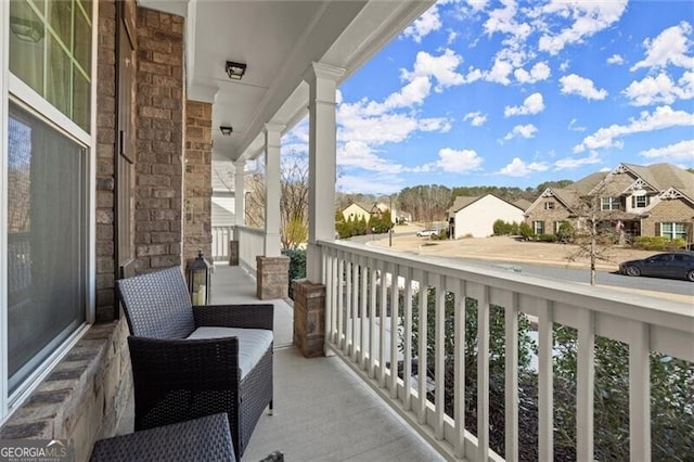 balcony with a porch and a residential view