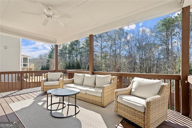 sunroom / solarium with ceiling fan