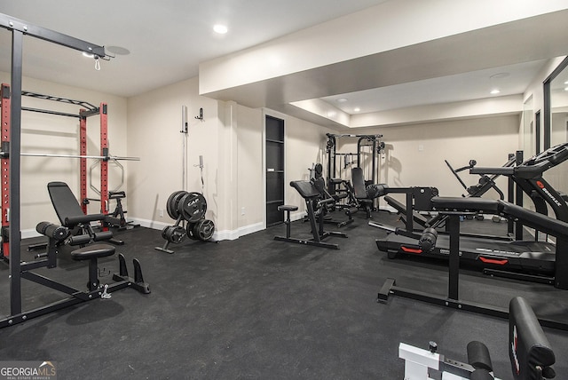 workout area with recessed lighting and baseboards