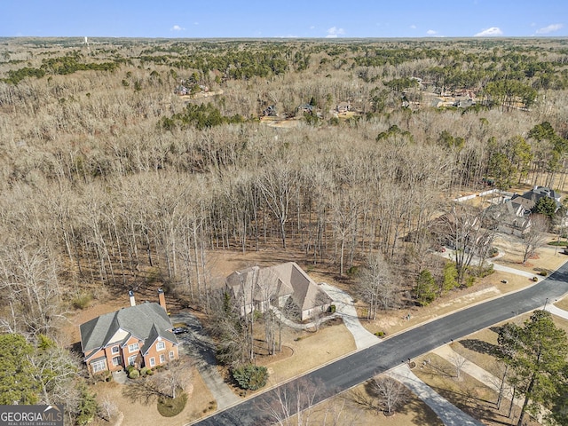 aerial view featuring a forest view