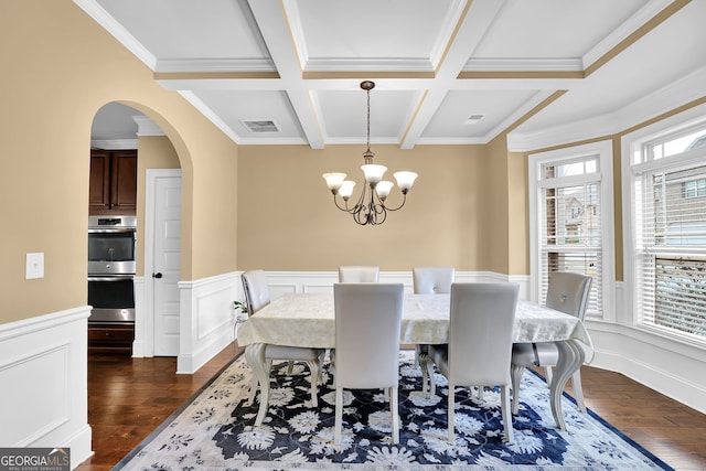 dining room featuring beam ceiling, arched walkways, coffered ceiling, and dark wood-type flooring