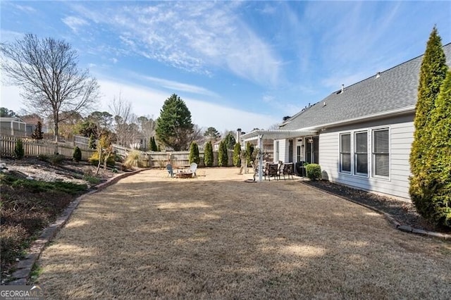 view of yard with a fenced backyard and a patio