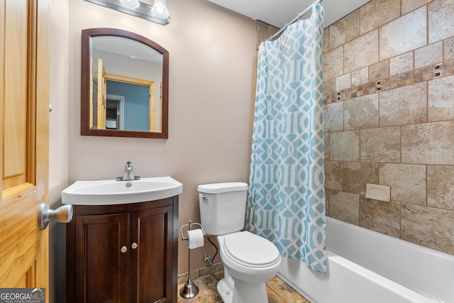 full bathroom with shower / tub combo, baseboards, toilet, tile patterned floors, and vanity