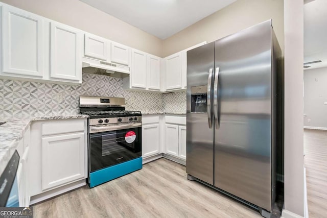 kitchen with stainless steel appliances, decorative backsplash, light wood-style floors, white cabinets, and under cabinet range hood