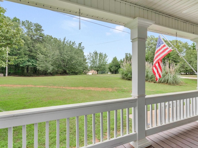 deck featuring a yard