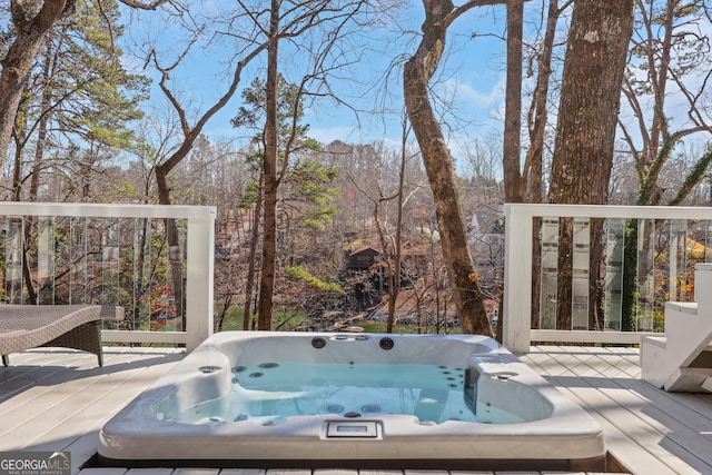 deck with a hot tub