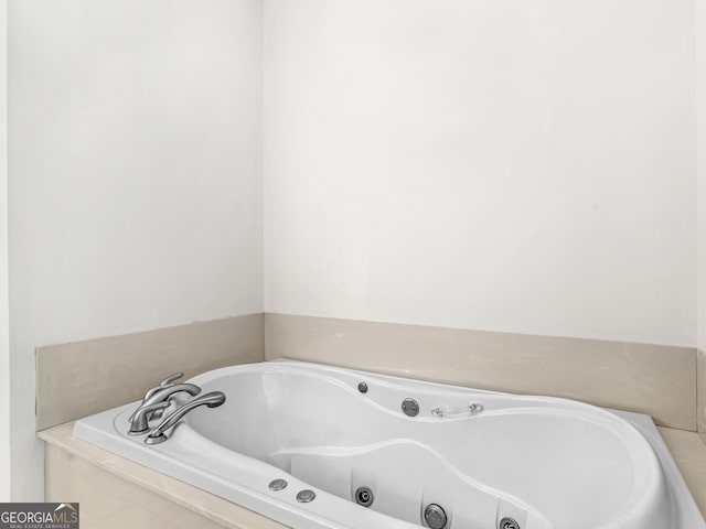 bathroom featuring a whirlpool tub