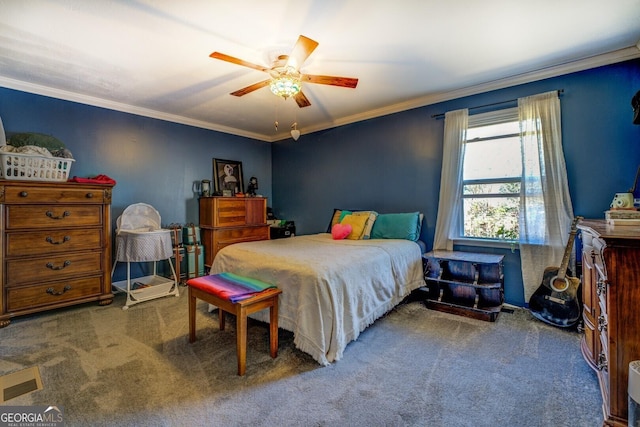 bedroom with ceiling fan, carpet, and crown molding