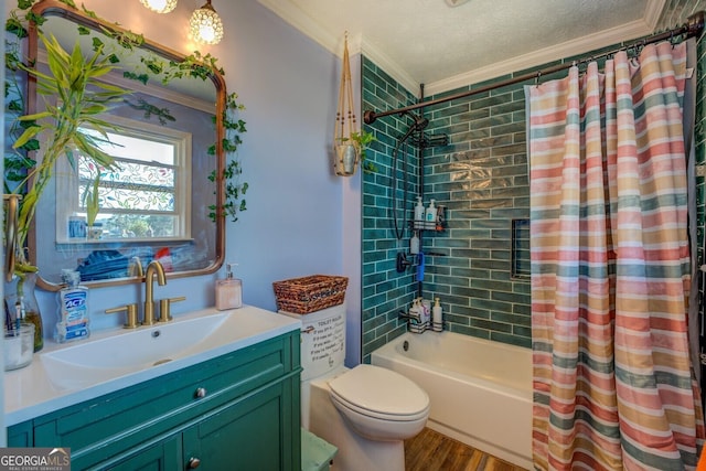 full bathroom featuring a textured ceiling, toilet, wood finished floors, vanity, and shower / tub combo with curtain