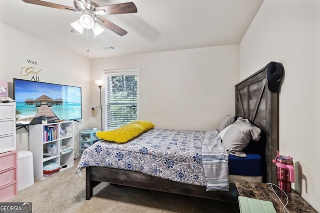 bedroom featuring ceiling fan, carpet flooring, and visible vents