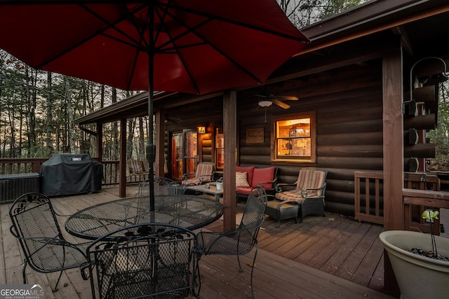 deck featuring outdoor dining space, an outdoor living space, a ceiling fan, and grilling area