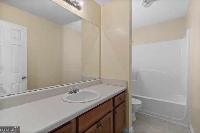 bathroom featuring vanity, toilet, and tile patterned floors