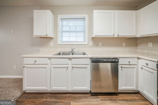 kitchen featuring white cabinets, dishwasher, dark wood-style floors, light countertops, and a sink