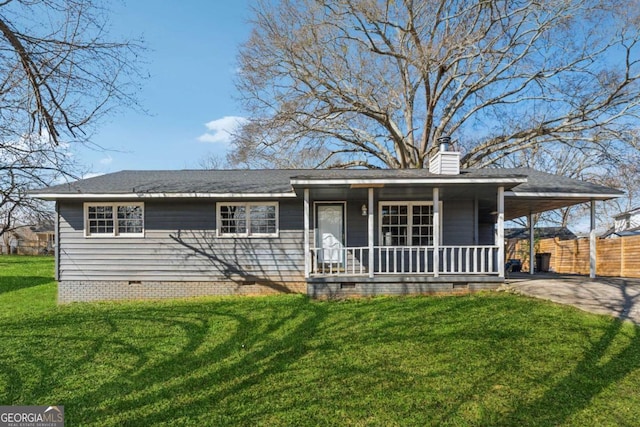 view of front of home featuring a carport, a front yard, crawl space, and a porch