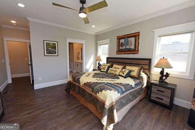 bedroom with ornamental molding, wood finished floors, and baseboards