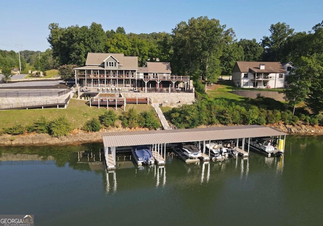 dock area featuring a water view and boat lift