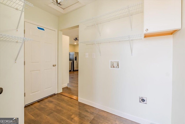 clothes washing area featuring laundry area, baseboards, dark wood-style flooring, washer hookup, and electric dryer hookup