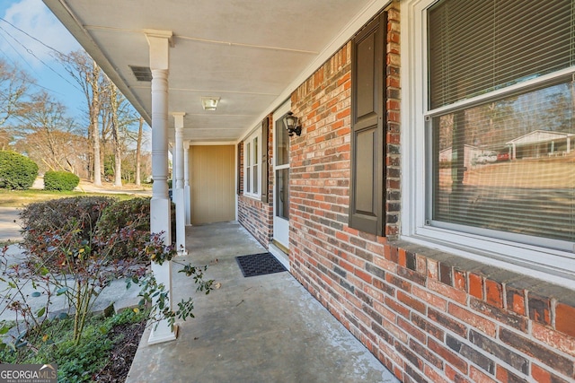 view of patio featuring a porch and visible vents