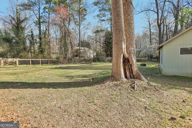 view of yard featuring fence