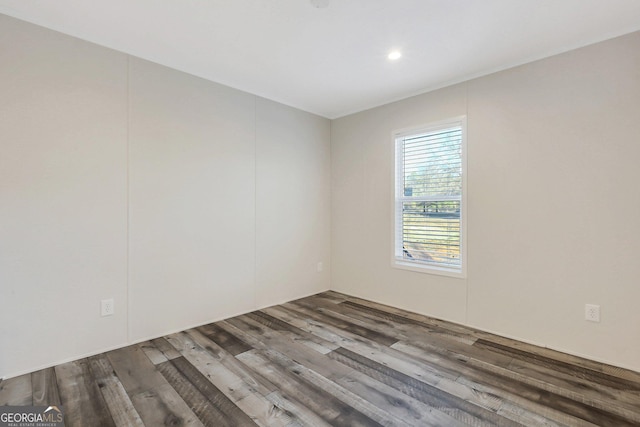 empty room featuring wood finished floors