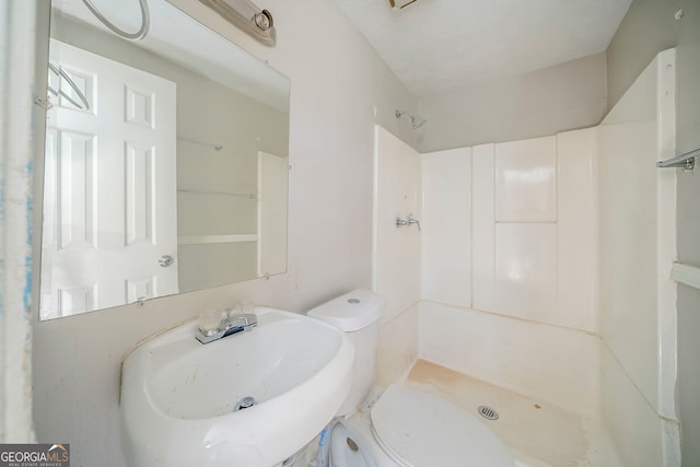 3524 Exeter Ct, Snellville, GA 30039 - bathroom with a shower, a sink, and toilet