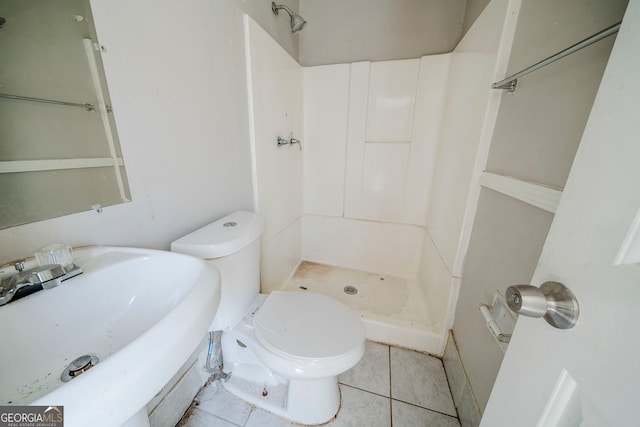 3524 Exeter Ct, Snellville, GA 30039 - full bathroom with tile patterned floors, a sink, toilet, and a shower stall