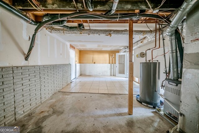 3524 Exeter Ct, Snellville, GA 30039 - below grade area with gas water heater and brick wall