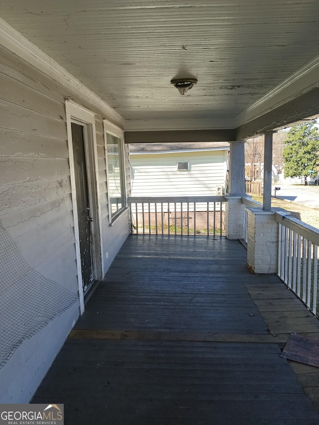 wooden deck with a porch