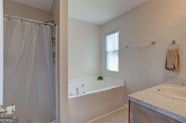 full bath with a shower with shower curtain, vanity, a bath, and tile patterned floors