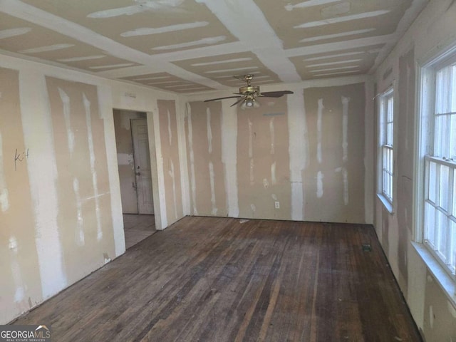 empty room with wood finished floors