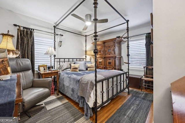 bedroom with wood finished floors