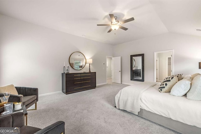 bedroom featuring a ceiling fan, lofted ceiling, light carpet, and baseboards