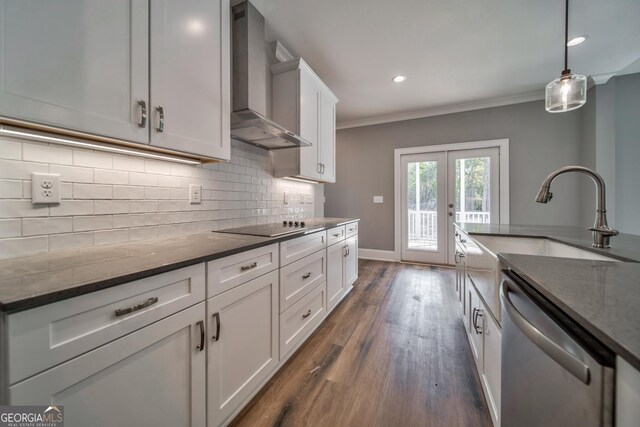 104 Bob White Dr, Calhoun, GA 30701 - kitchen with dishwasher, wall chimney exhaust hood, french doors, dark stone counters, and white cabinets