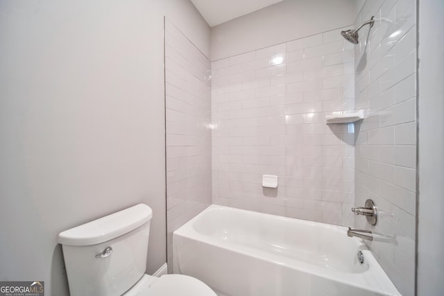 full bathroom with toilet and washtub / shower combination