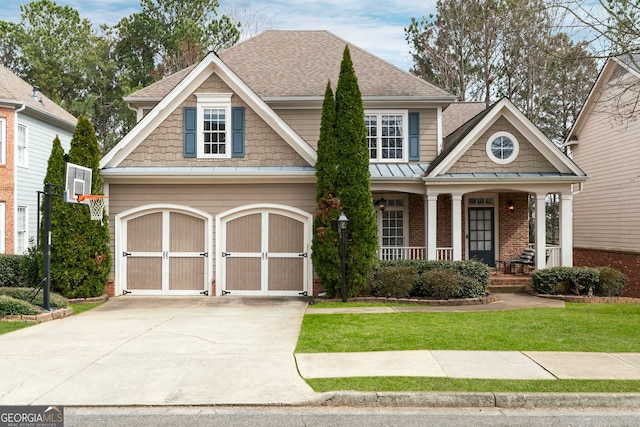 craftsman inspired home with driveway, a garage, a shingled roof, a porch, and brick siding