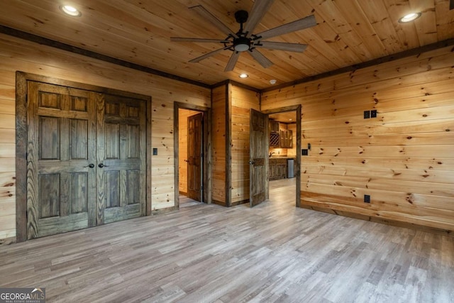 unfurnished room featuring recessed lighting, wood walls, wood finished floors, wood ceiling, and a ceiling fan