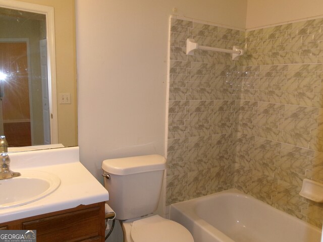 full bath featuring toilet, shower / tub combination, and vanity