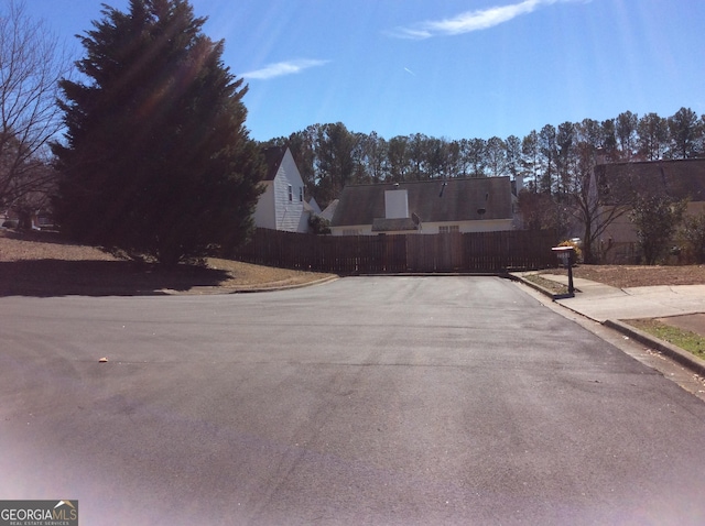 view of road featuring sidewalks and curbs