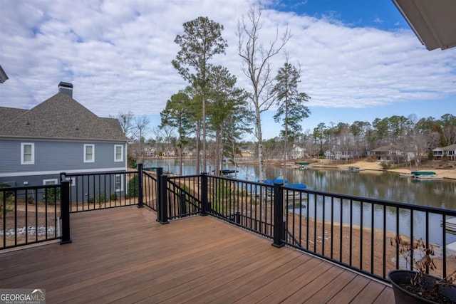 deck featuring a water view