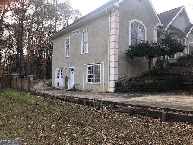 view of home's exterior with stucco siding