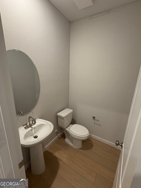 203 Park View Ln, Kingsland, GA 31548 - bathroom with wood finished floors and toilet